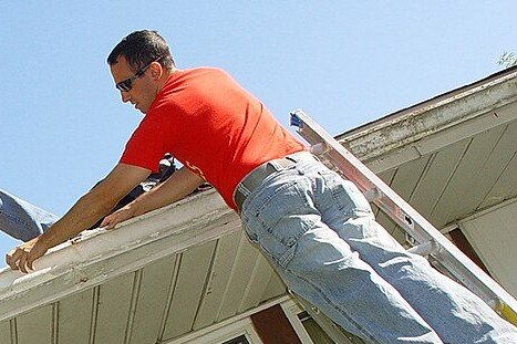 Repairing a gutter (U.S. Navy photo by Chief Mass Communication Specialist Lucy M. Quinn via Wikimedia Commons)