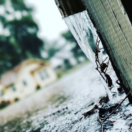 Broken gutter downspout